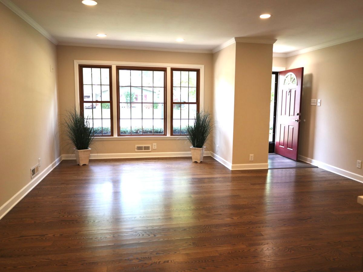 Spotless living room with hardwood floors